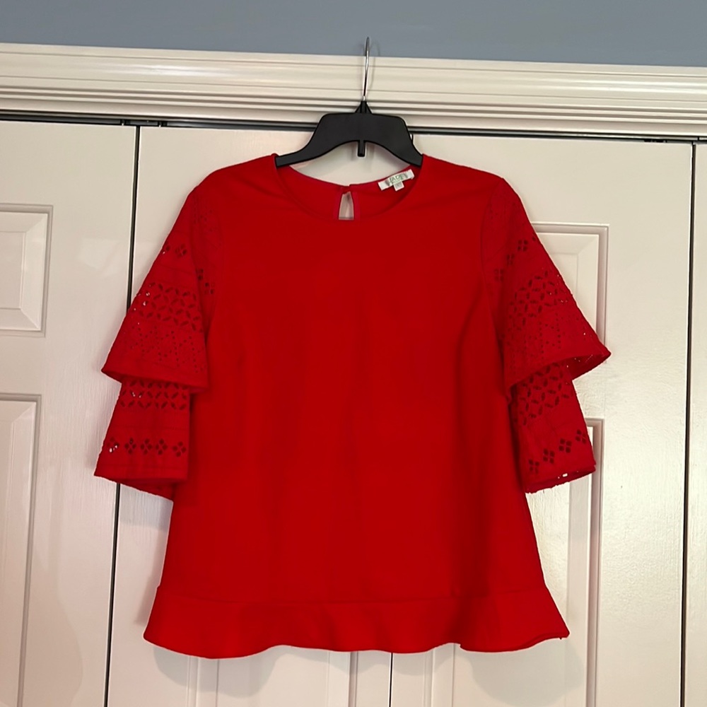 Red Jade top size large.  Tiered eyelet sleeves